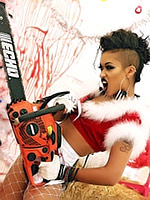Skin Diamond chopping up with a chainsaw